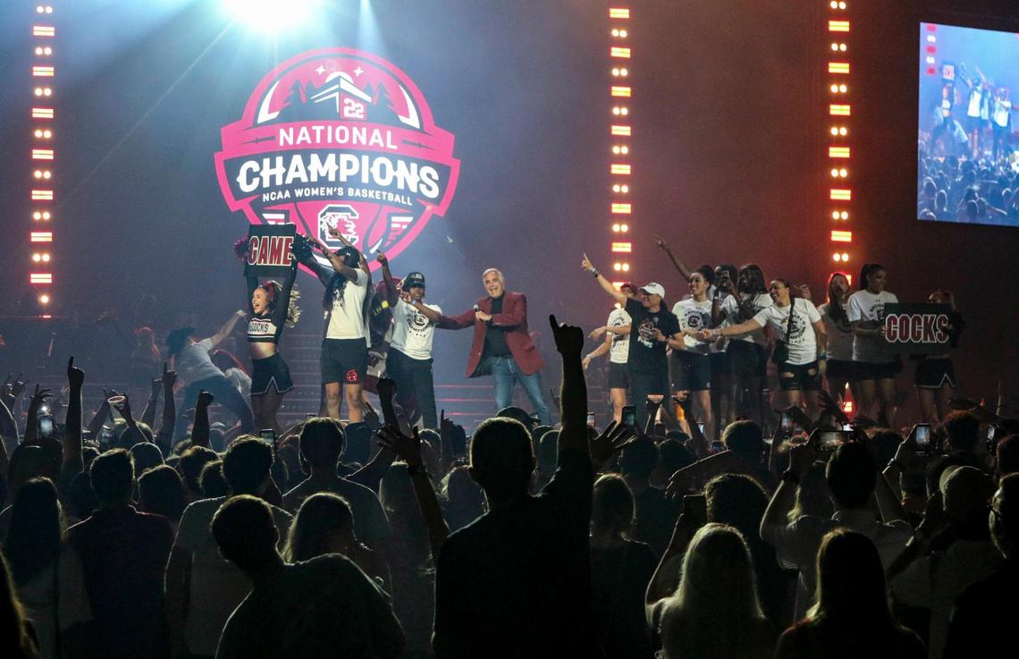 The University of South Carolina Womens basketball team and interim president Harris Pastides celebrate with fans before Darius Rucker performs a concert at the Colonial Life Arena on Sunday, April, 24, 2022. Rucker promised the concert for USC when the team won the 2022 National Championship.