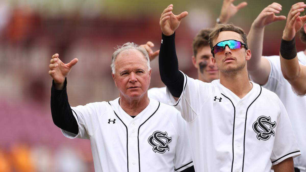 South Carolina head coach Paul Mainieri stands for the alma mater following the Gamecocks’ game against Tennessee in Columbia on Sunday, March 30, 2025.