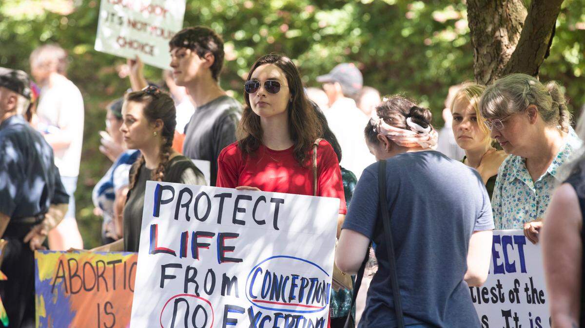 Both sides of the abortion debate rally before a hearing in South Carolina on July 7, 2022.