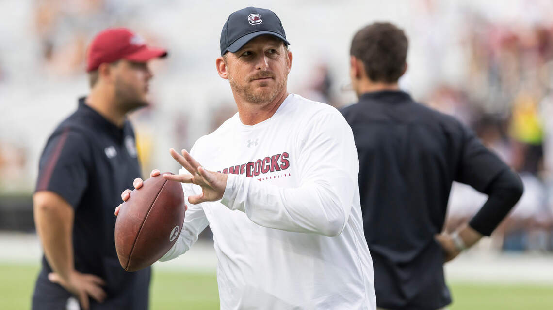USC’s Marcus Satterfield makes a connection with another Class of 2024 quarterback