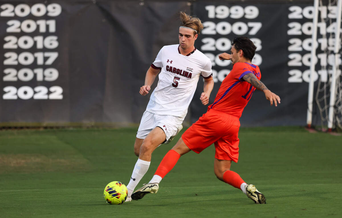 South Carolina defender William Nilsson (5) is defended by Clemson forward Antonio Illuminato (17) during the Gamecocks’ game against Tigers in Columbia on Friday, August 30, 2024.