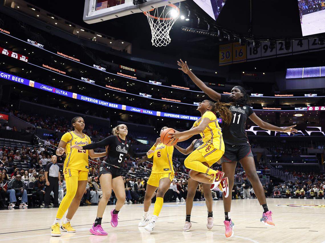 Londynn Jones #3 of the USC Trojans takes a shot against Madina Okot #11 of the South Carolina Gamecocks during the first half at Crypto.com Arena on November 15, 2025 in Los Angeles, California. 