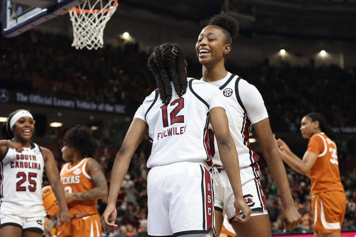 University of South Carolina’s MiLaysia Fulwiley (12) and University of South Carolina’s Joyce Edwards (8) celebrate during the second half of action against Texas in the SEC Tournament at the Bon Secours Wellness Arena in Greenville on Sunday, March 9, 2025.