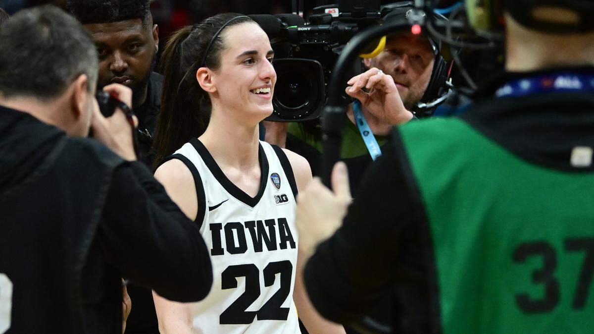 Apr 5, 2024; Cleveland, OH, USA; Iowa Hawkeyes guard Caitlin Clark (22) reacts after defeating the Connecticut Huskies in the semifinals of the Final Four of the womens 2024 NCAA Tournament at Rocket Mortgage FieldHouse. Mandatory Credit: Ken Blaze-USA TODAY Sports