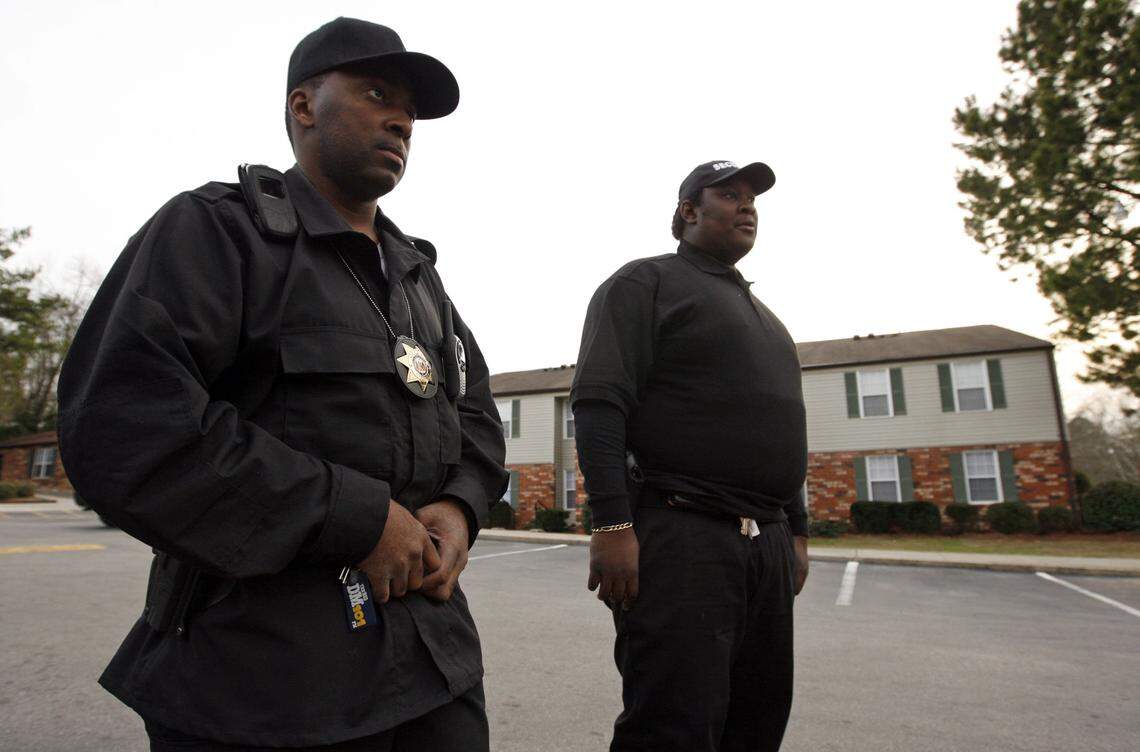 Elite Protection Agency security officers Ronald Rogers and Q. Harris patrol  at Gable Oaks Apartments on Feb. 29, 2008.