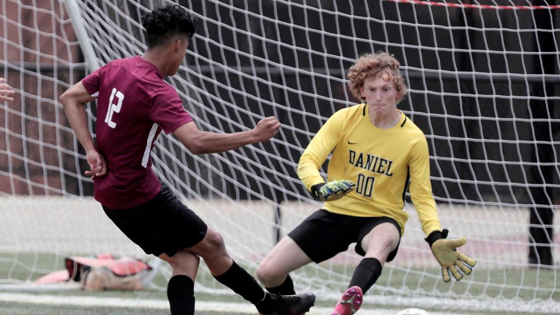 Brookland-Cayce’s Eduardo Moisa Membreno 12 scores as Daniel’s Branton Huss 00 fails to block at Irmo High School on Saturday, May 15, 2021.