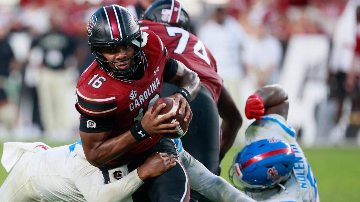 South Carolina quarterback LaNorris Sellers (16) is tackled by Ole Miss defenders on Saturday, October 5, 2024.