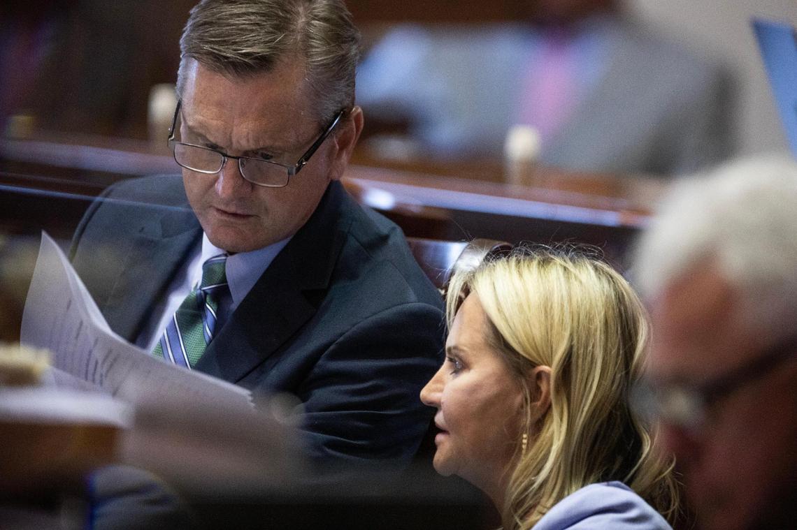 Senator Tom Davis, R-Beaufort, speaks with Senator Sandy Senn, R-Charleston, as the senate debates a bill that would ban abortion after six weeks on Tuesday, May 23, 2023.