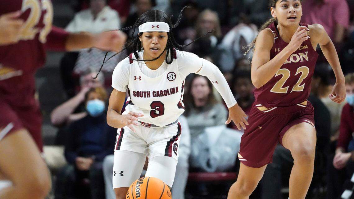 South Carolina guard Destanni Henderson (3) dribbles the ball against Elon guard Vanessa Taylor (22) during the first half of an NCAA college basketball game Friday, Nov. 26, 2021, in Columbia, S.C. (AP Photo/Sean Rayford)