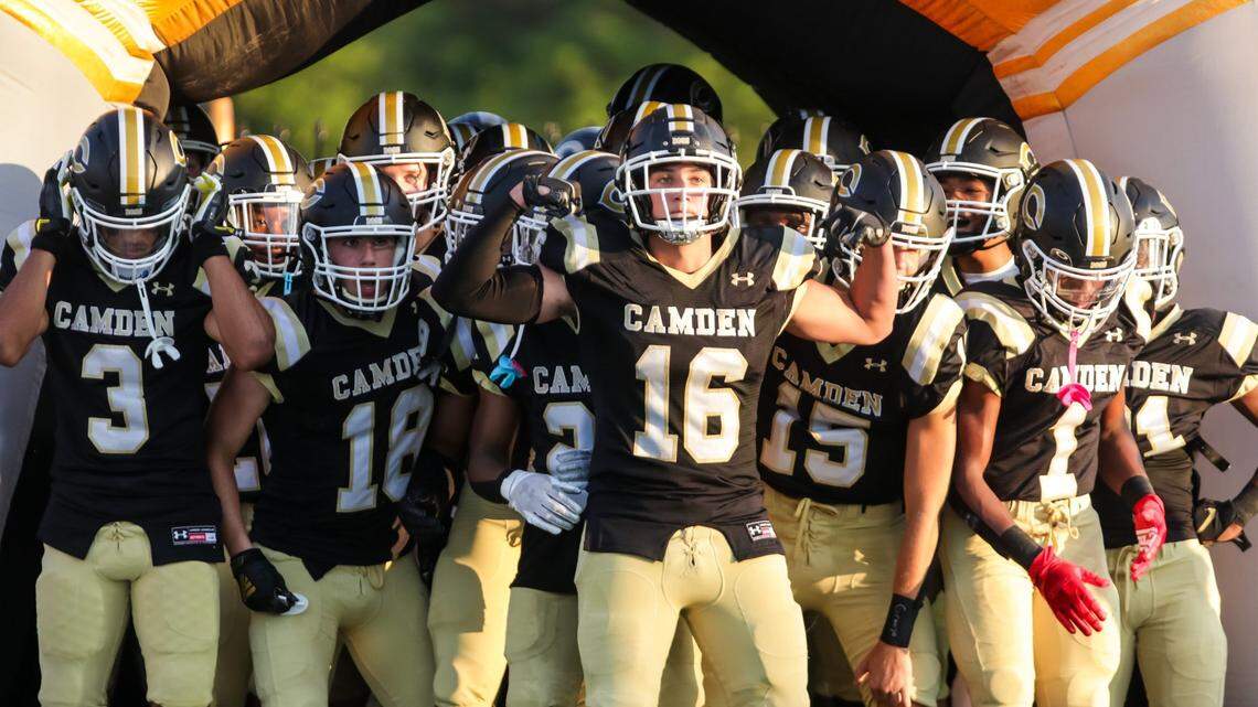 Camden Bulldogs players prepare to enter the field before the game against the Gray Collegiate War Eagles.