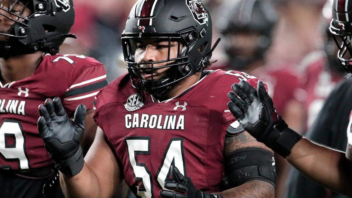 South Carolina’s Dylan Wonnum, Jovaughn Gwyn and Vershon Lee during warmups ahead of the Gamecocks’ Oct. 22, 2022 game against Texas A&M at Williams-Brice Stadium.