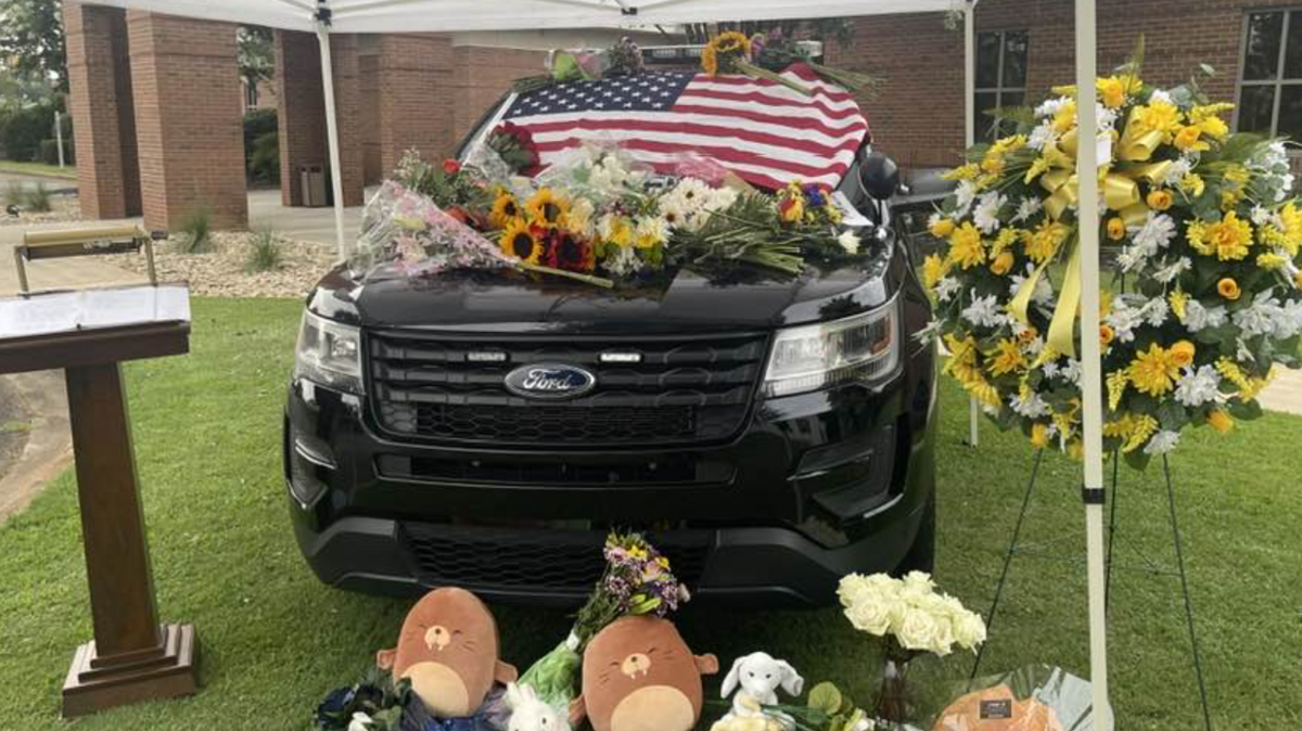 A memorial to Officer Matthew Hare was set up outside Easley Police Department.