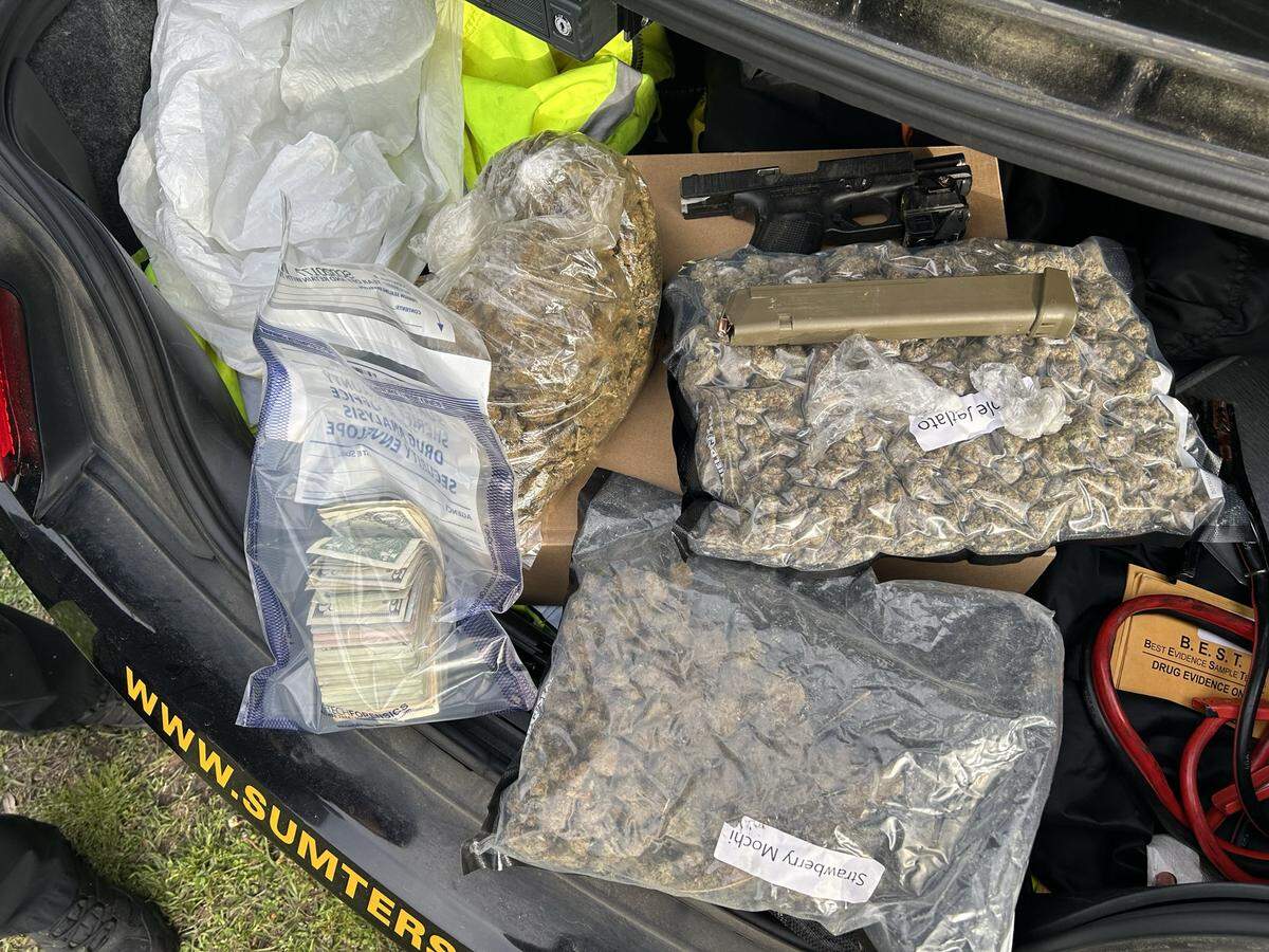 Police confiscated drugs and a weapon among other items after a chase.