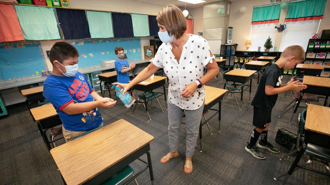 Who pays the fine under Columbia’s new school face mask order?