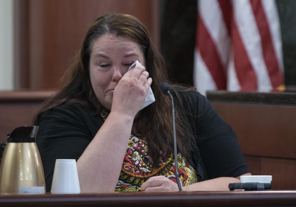Christina Ehlke, a neighbor and former babysitter to the Jones children, wipes her eyes during the trail of Tim Jones in Lexington. Timothy Jones, Jr. is accused of killing his 5 young children in 2014. Jones, who faces the death penalty, has pleaded guilty by reason of insanity. 5/15/19