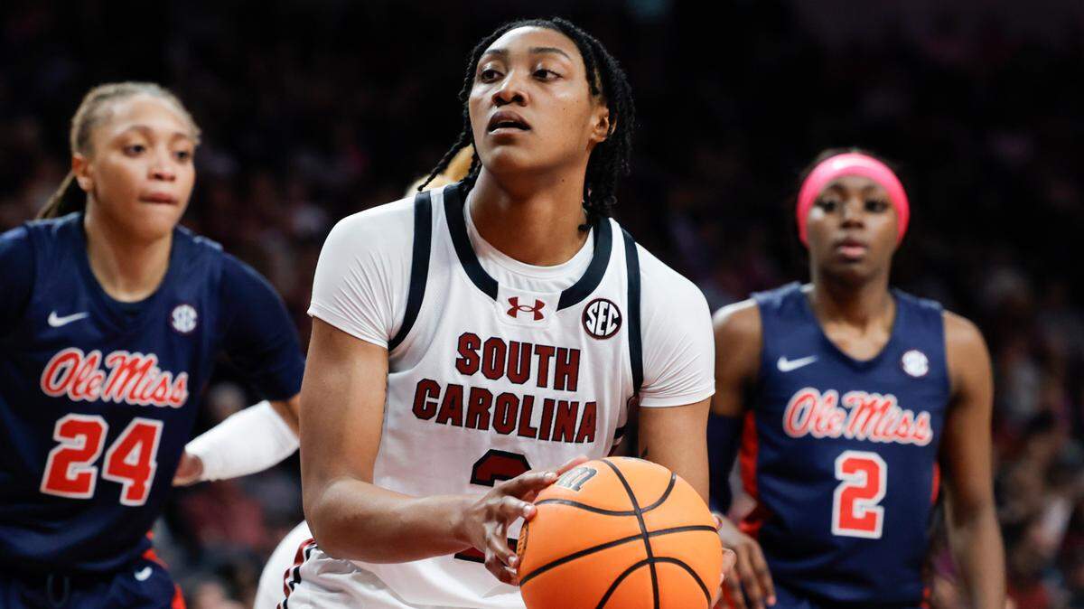South Carolina’s Ashlyn Watkins (2) looks to shoot as Ole Miss defenders Madison Scott (24) and Marquesa Davis (2) look on during the second half of action in the Colonial Life Arena on Sunday, Feb. 4, 2024.