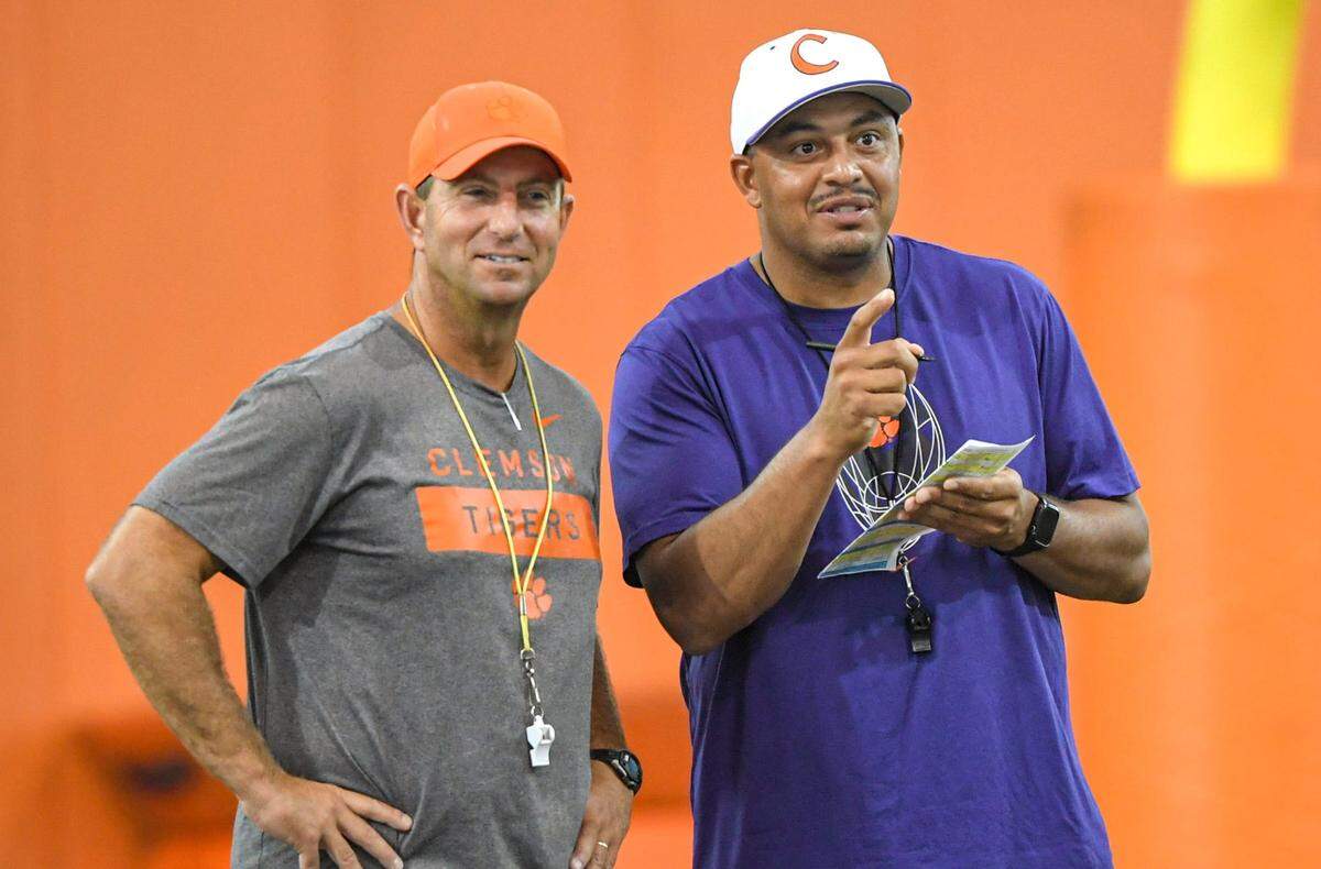 Clemson head coach Dabo Swinney and Clemson offensive coordinator Tony Elliott during practice in Clemson, S.C. Monday, August 9, 2021.