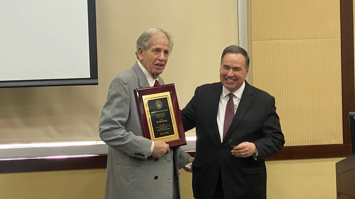 South Carolina Supreme Court Chief Justice John Kittredge (right) gave a rare award for lifetime legal accomplishment to Columbia attorney Jack Swerling on Friday, Dec. 13, 2024.
