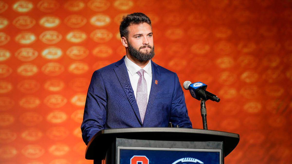 Syracuse quarterback Garrett Shrader answers questions during ACC Kickoff on Tuesday at The Westin Charlotte.
