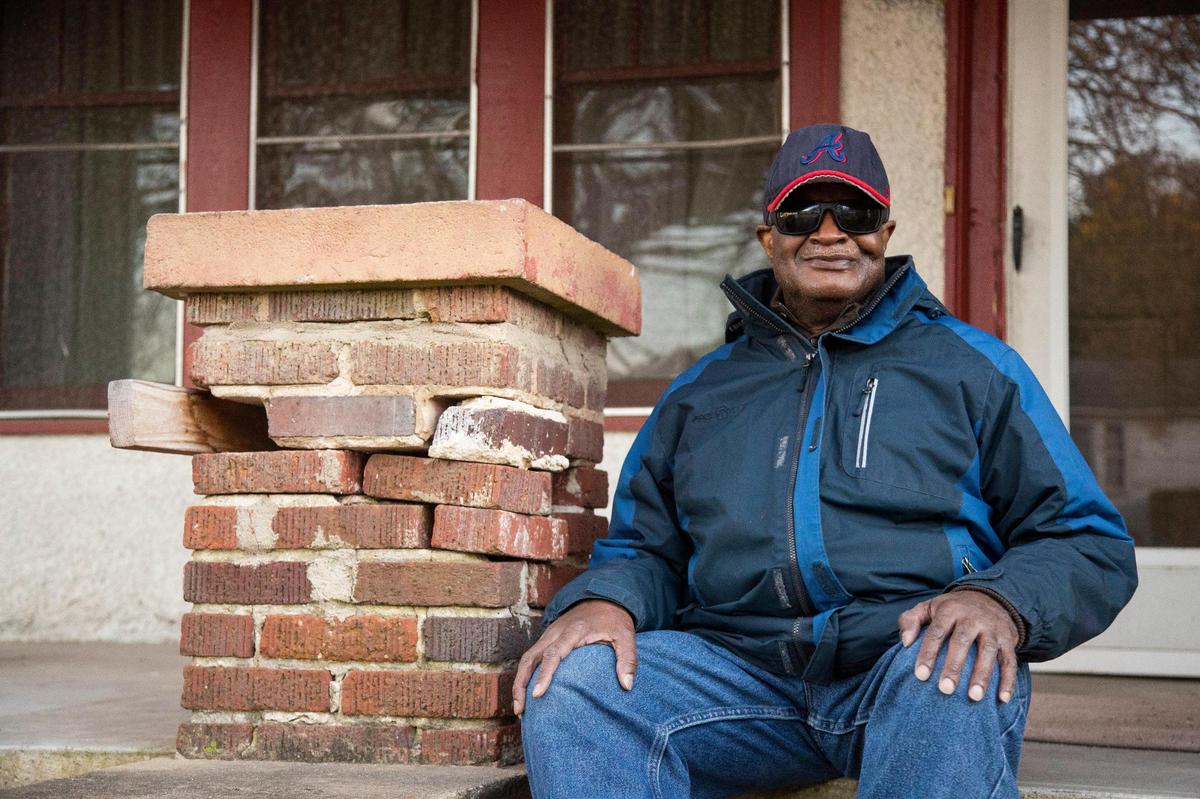José Duvall in front of his home in Columbia, South Carolina on Wednesday, November 25, 2021. Duvall was told that repairs through the city’s flood relief program would start in 2018, and have still not begun.