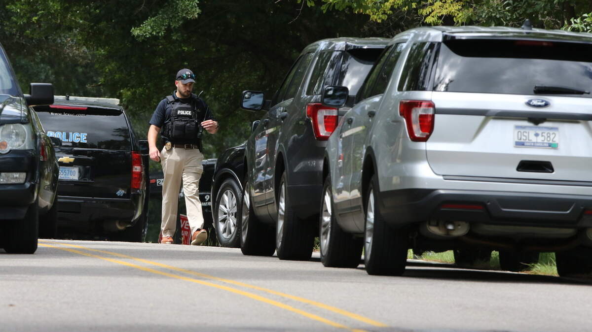 Lexington police said a person is barricaded in a shed, and the Crisis Negotiations Team is involved.
