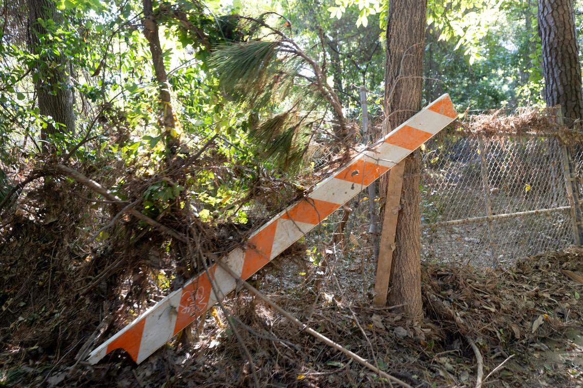 A layer of mud and debris, washed up from the Congaree River, covers the Cayce Riverwalk where the Congaree River over topped its banks. Heavy rains upstream from Hurricane Helene caused the river to crest at 30.58 feet.