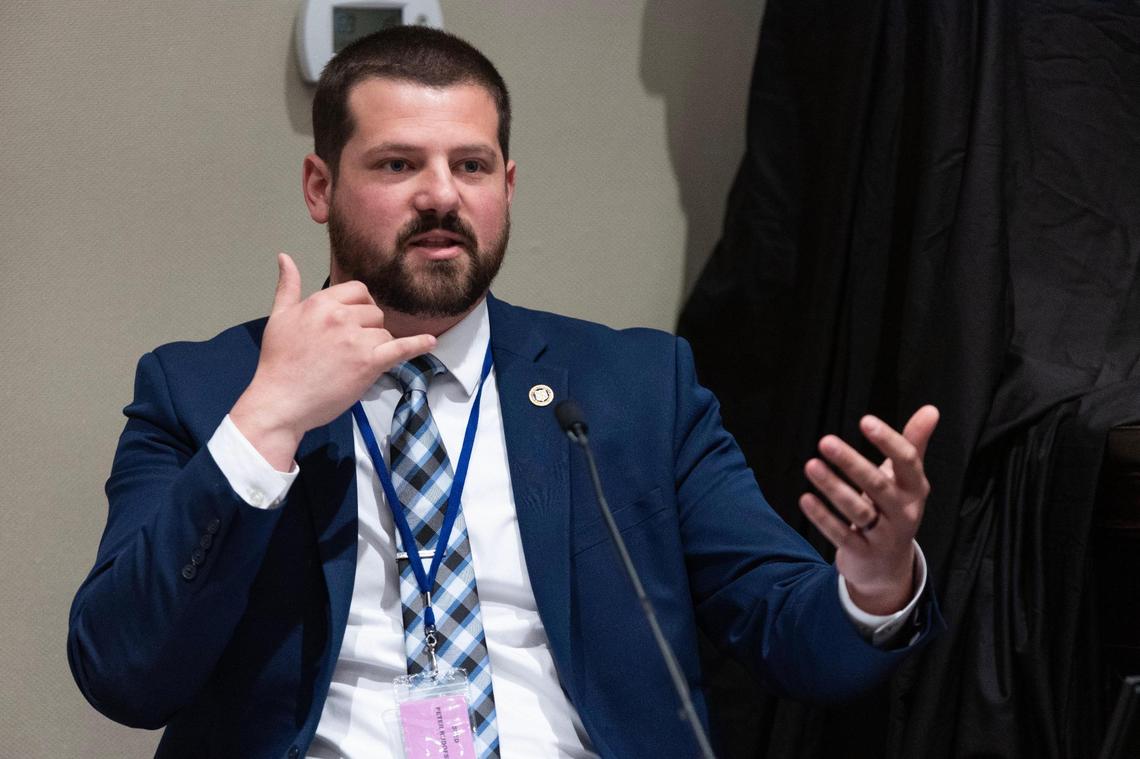 SLED Special Agent Peter Rudofski gestures how someone may have made a phone call using Alex Murdaugh’s phone while looking and turning his wife Maggie Murdaugh’s phone during Alex Murdaugh’s trial for murder at the Colleton County Courthouse on Friday, February 17, 2023. Joshua Boucher/The State/Pool
