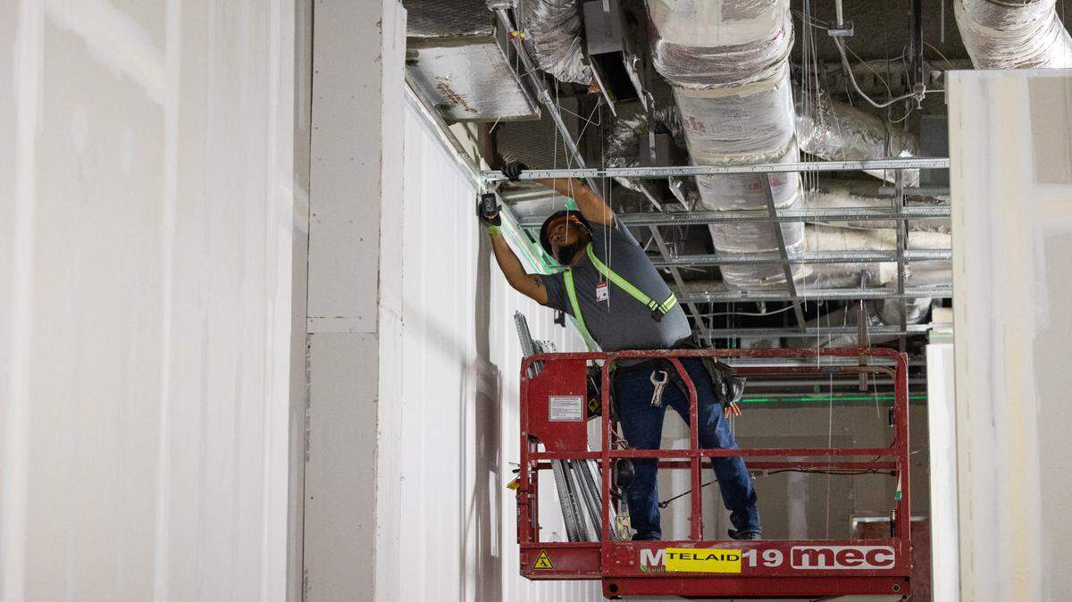 Workers install new drywall in the Columbia Museum of Art in downtown Columbia, South Carolina on Friday, February 28, 2025.