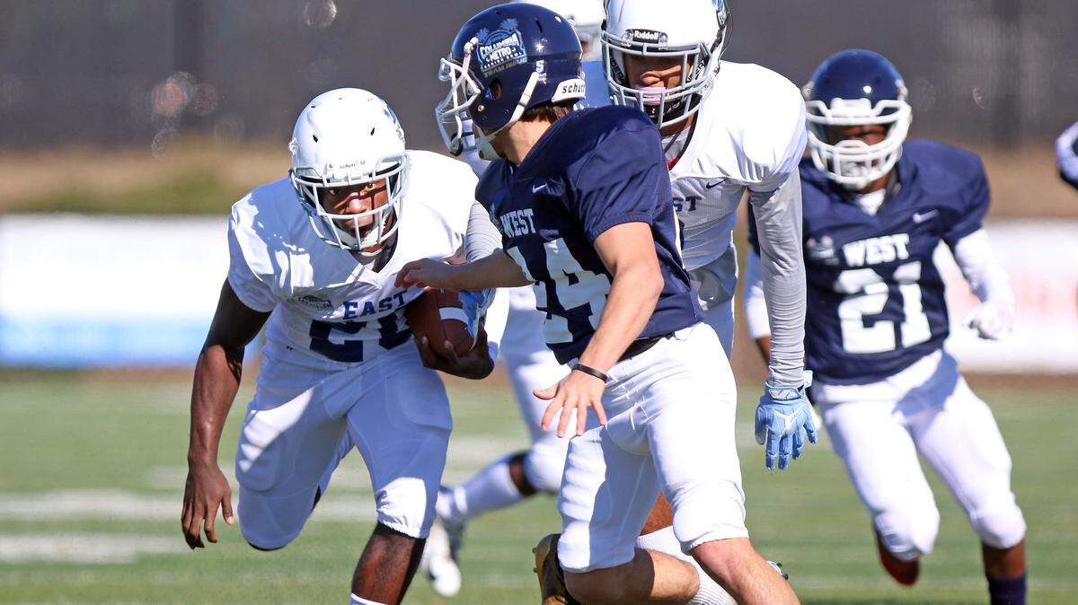 East team running back Thomas Green (Columbia High) carries the ball Saturday at the 2018 Columbia Metro Senior Bowl held at Irmo High School.