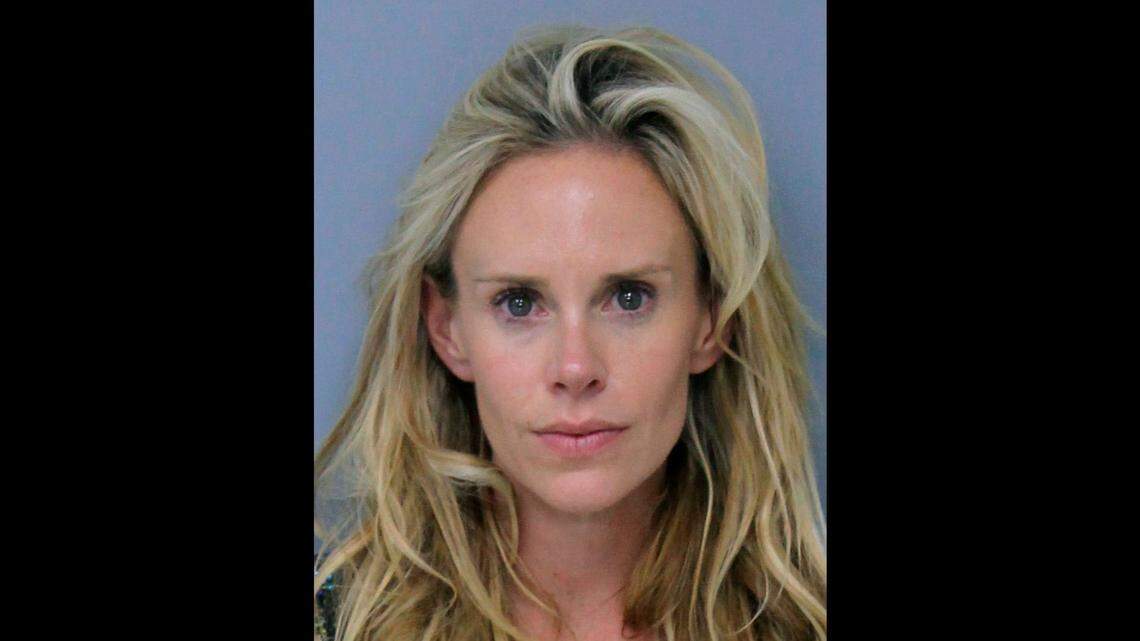 This Saturday, May 12, 2018, booking photo provided by St. Johns County, Florida, Sheriff's Office shows Krista Glover, the wife of former U.S. Open champion Lucas Glover. She was arrested on charges related to domestic violence during the weekend of The Players Championship.