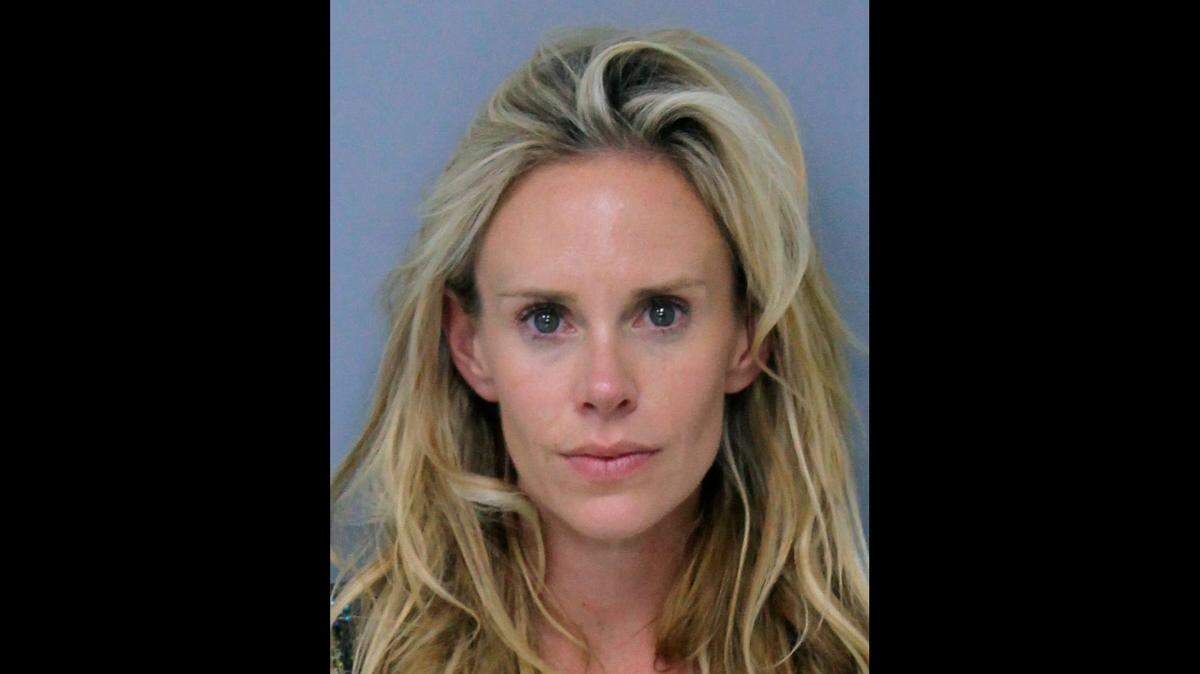 This Saturday, May 12, 2018, booking photo provided by St. Johns County, Florida, Sheriff's Office shows Krista Glover, the wife of former U.S. Open champion Lucas Glover. She was arrested on charges related to domestic violence during the weekend of The Players Championship.