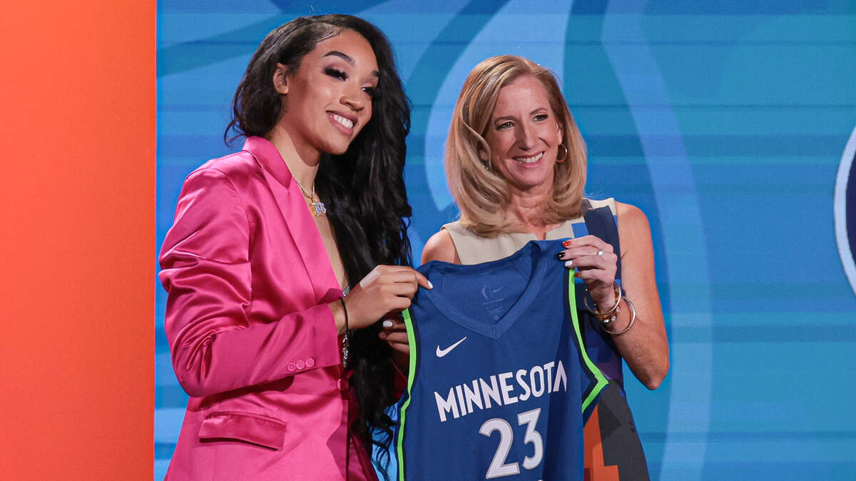 From April 10, Brea Beal poses for a photo with WNBA Commissioner Cathy Engelbert after being drafted 24th overall by the Minnesota Lynx.