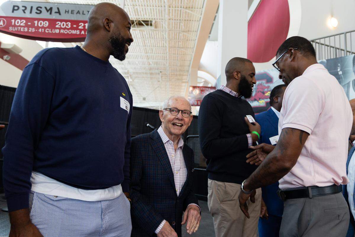 Former South Carolina basketball coach Dave Odom speaks with former players at Colonial Life Arena on Saturday, May 2, 2026.
