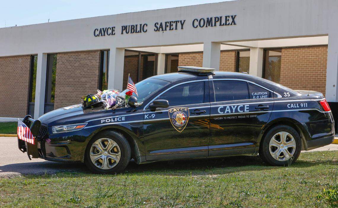 The patrol car of Roy Andrew “Drew” Barr, is set up as a memorial to the 28-year-old Cayce Police officer who was shot and killed during a domestic call on Sunday, April, 24, 2022.