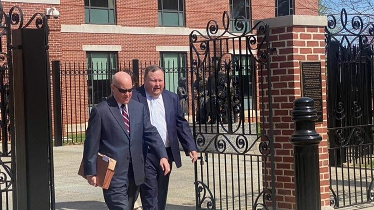 Attorney Johnny Gasser, left, and his client, Dr. James Oscar Williams, a family medicine doctor who practices in West Columbia, on Monday, March 6, 2023, walk out of the Matthew J. Perry Federal courthouse in Columbia, S.C.