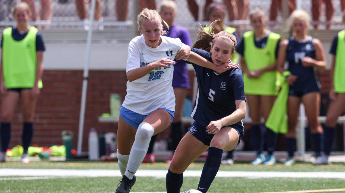 Lila Bowers (10) of Chapin and Kaelin Antrim (5) of Clover battle for possession of the ball during the second half of the SCHSL Class 5A Girls Soccer State Final at Memorial Stadium in Columbia on Friday, May 10, 2024.