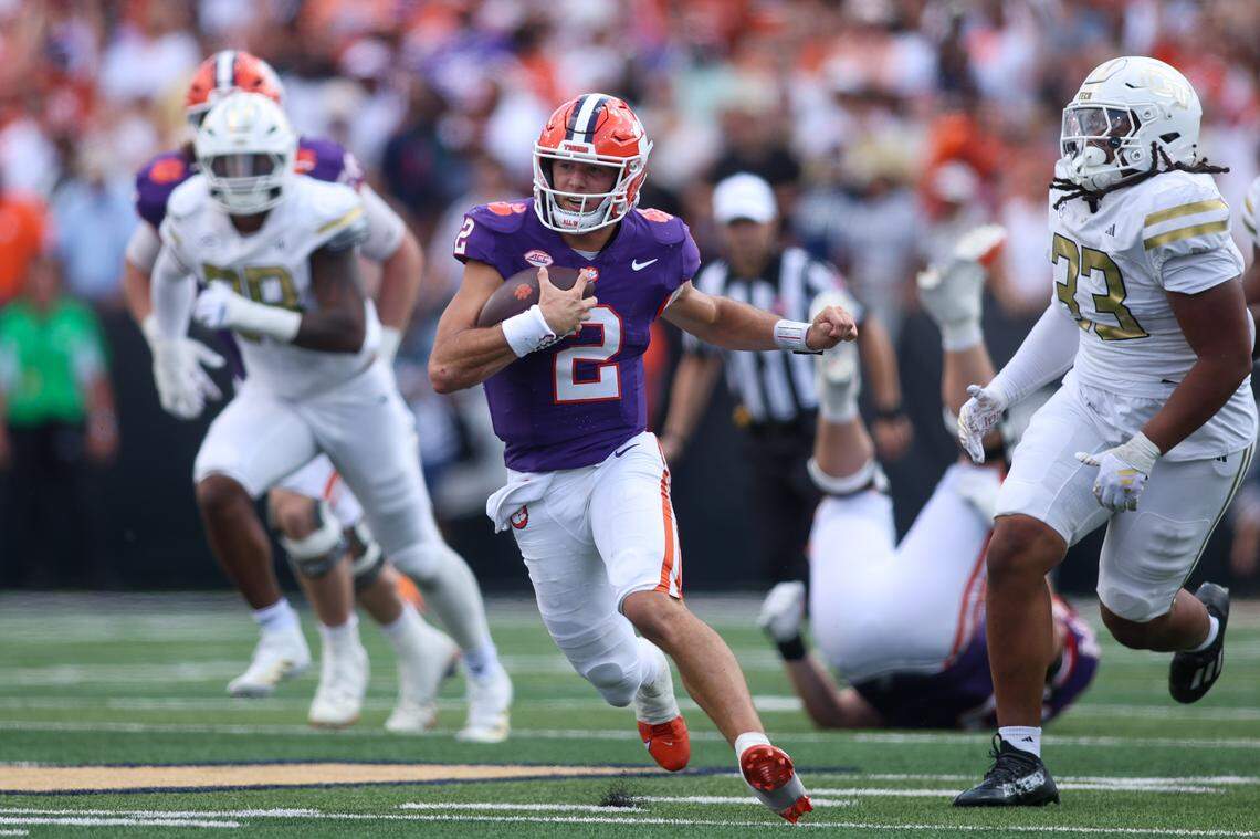Sep 13, 2025; Atlanta, Georgia, USA; Clemson Tigers quarterback Cade Klubnik (2) runs the ball against the Georgia Tech Yellow Jackets in the fourth quarter at Bobby Dodd Stadium at Hyundai Field.