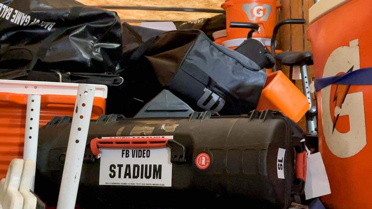 A semi-truck is used to haul the necessities for the team when they go to away games. Students load the truck in under an hour.
