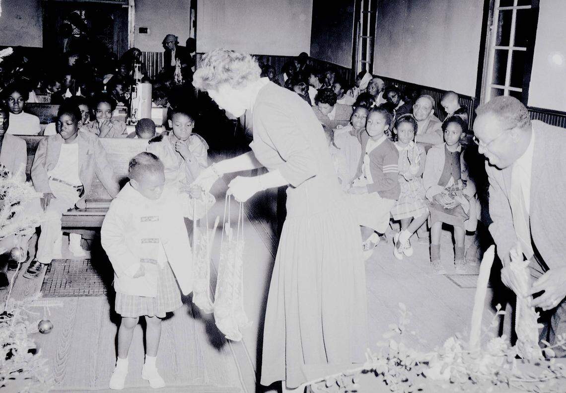 A 1959 photo believed to be the only of Virginia Williams while she lived. Virginia is on the second row of pews in the white sweater furthest to the left, her family believes.