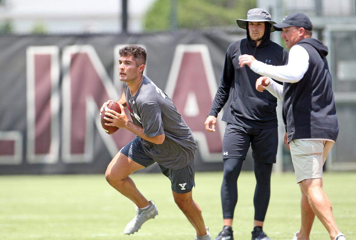 South Carolina quarterback recruit Dante Reno (Class of 2024) works out with Gamecock QB Luke Doty and offensive coordinator Marcus Satterfield at the Shane Beamer Football Camp held Thursday, June 9, 2022.