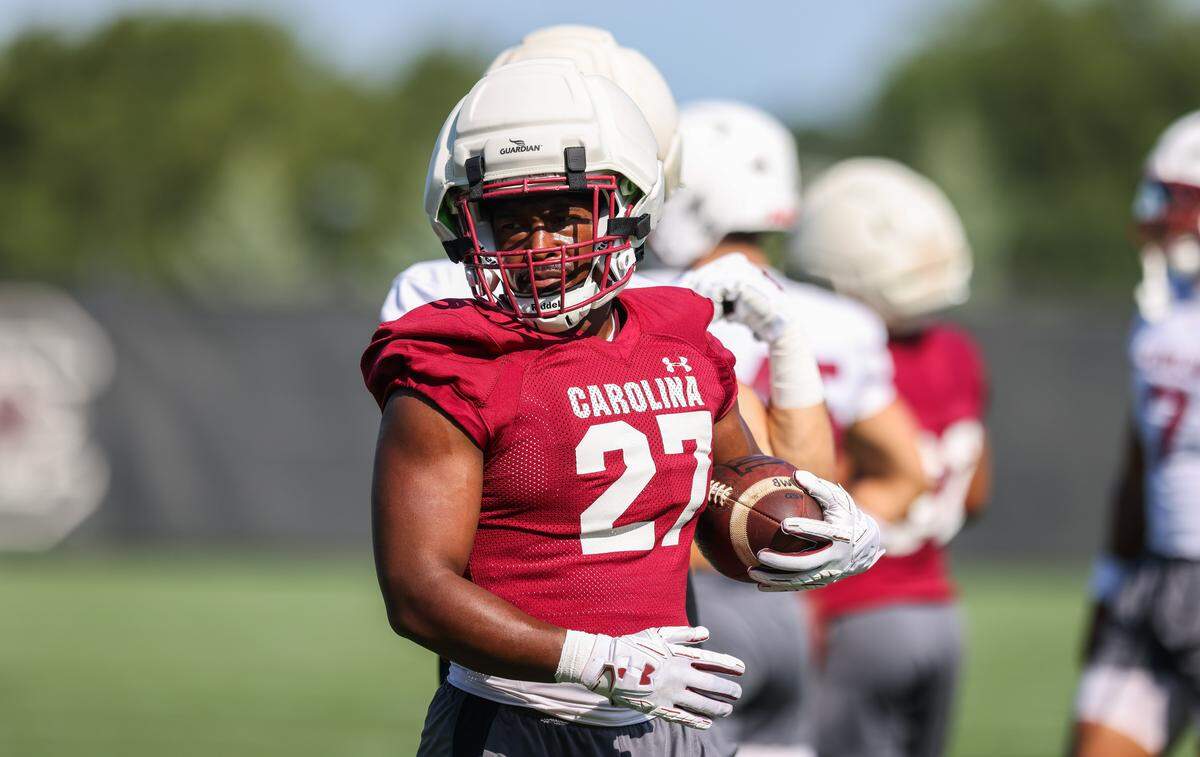 South Carolina running back Oscar Adaway III (27) runs drills during practice in Columbia on Friday, August 1, 2025.