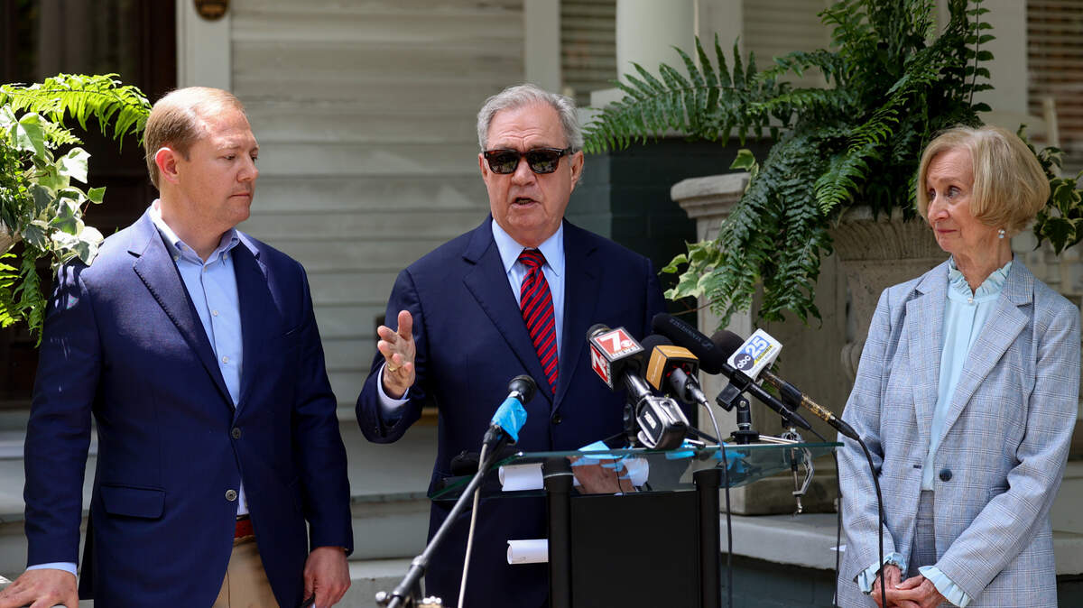 Attorney Dick Harpootlian along with State Senator Wes Climer, R-York, and Carol Herring hold a press conference outside Harpootlian’s Columbia law office on Monday, June, 9, 2025. 