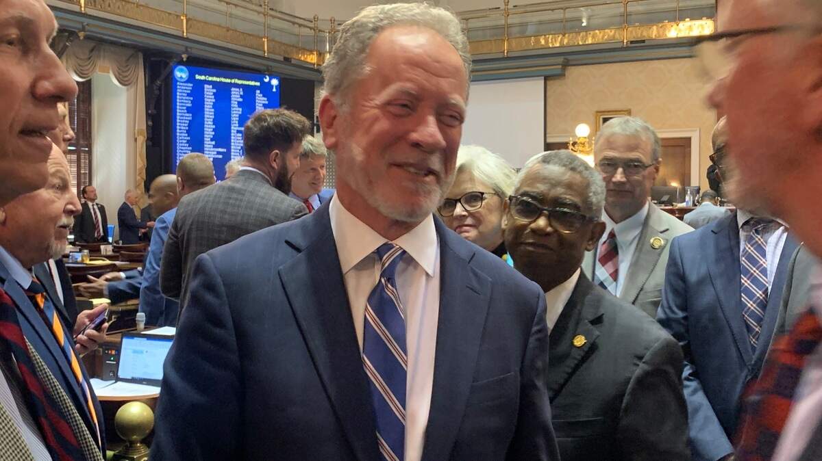 Former S.C. Gov. David Beasley greets lawmakers on the House floor following his address to a joint assembly on Wed., May 3, 2023. Beasley recently retired after serving for six years as executive director for the World Food Programme.
