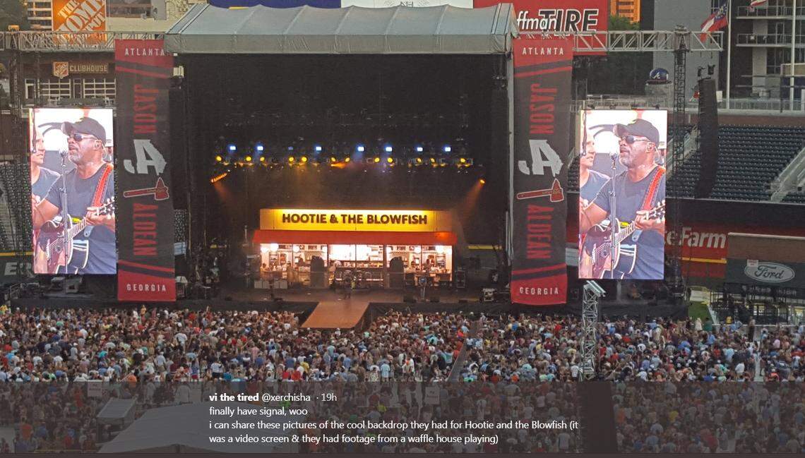Screenshot of a video monitor showing the front of a Waffle House as Hootie & the Blowfish played in Atlanta’s SunTrust Park.