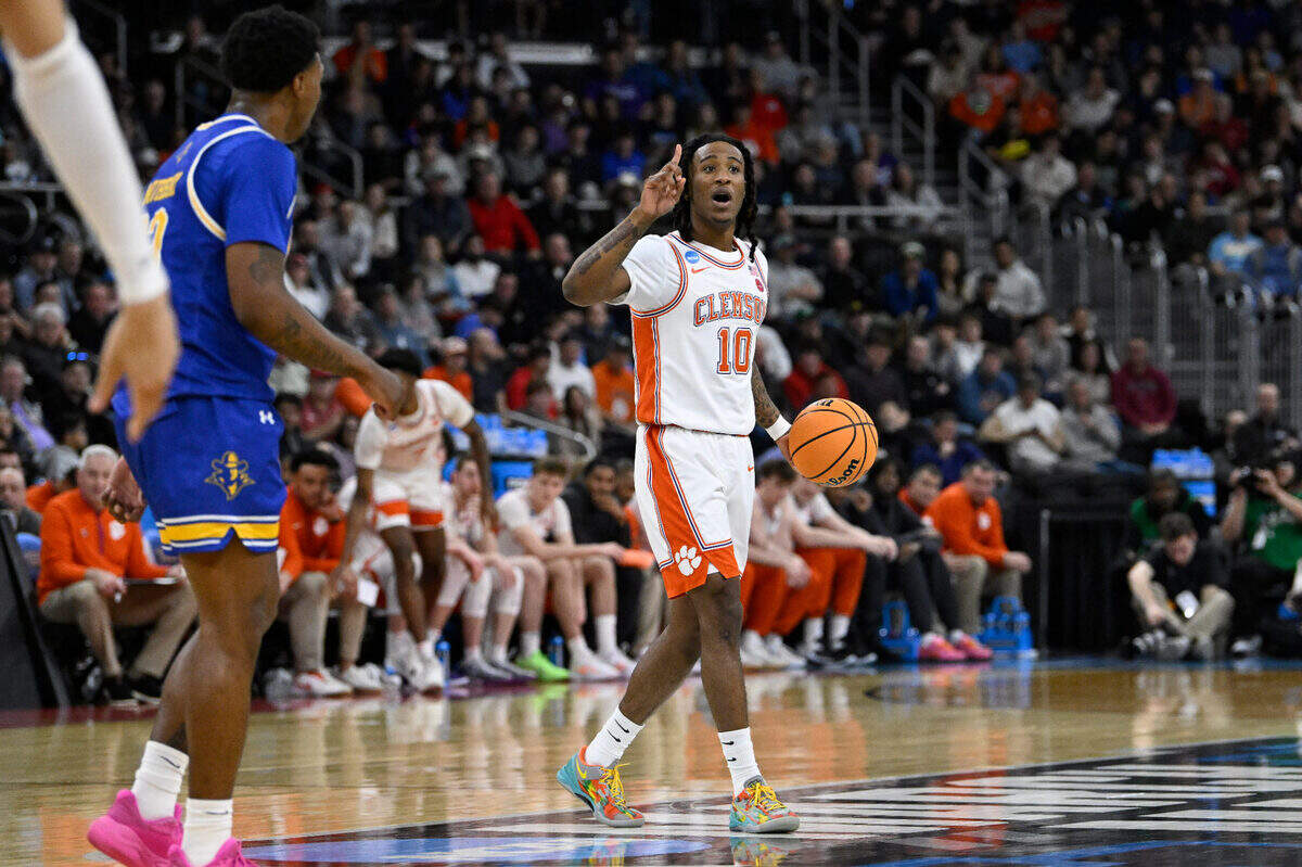 Mar 20, 2025; Providence, RI, USA; Clemson Tigers guard Del Jones (10) controls the ball against the McNeese State Cowboys during the first half at Amica Mutual Pavilion.