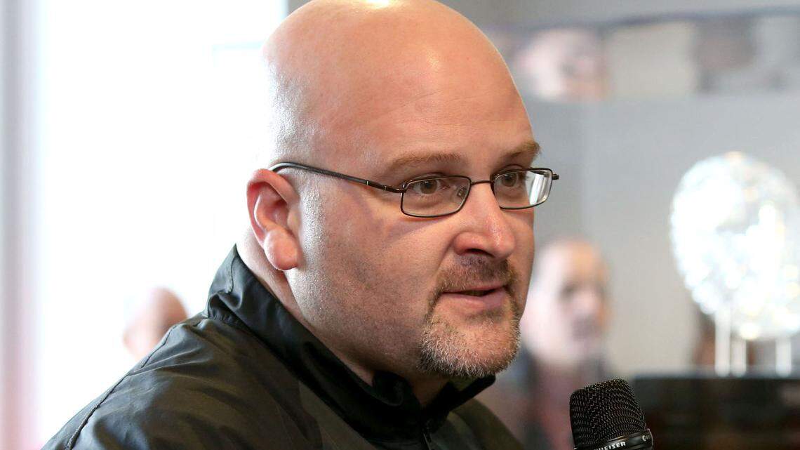 Georgia offensive line coach Will Friend answers questions from fans about Georgia’s recruiting class on national signing day Wednesday, Feb. 5, 2014, in Athens, Ga. (AP Photo/Jason Getz)