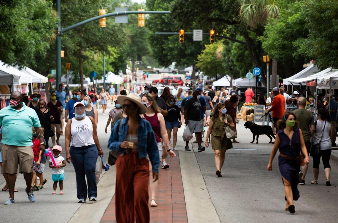 Soda City Market on Saturday, June 27, 2020. Most family groups stayed a safe distance from one another Saturday morning, and nearly everyone wore masks or sat at the edges of the market to eat and drink without a mask.