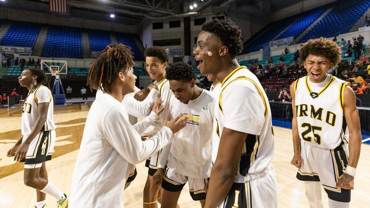 Irmo players celebrate their win over Hartsville at the Florence Center in Florence on Friday, February 24, 2023.