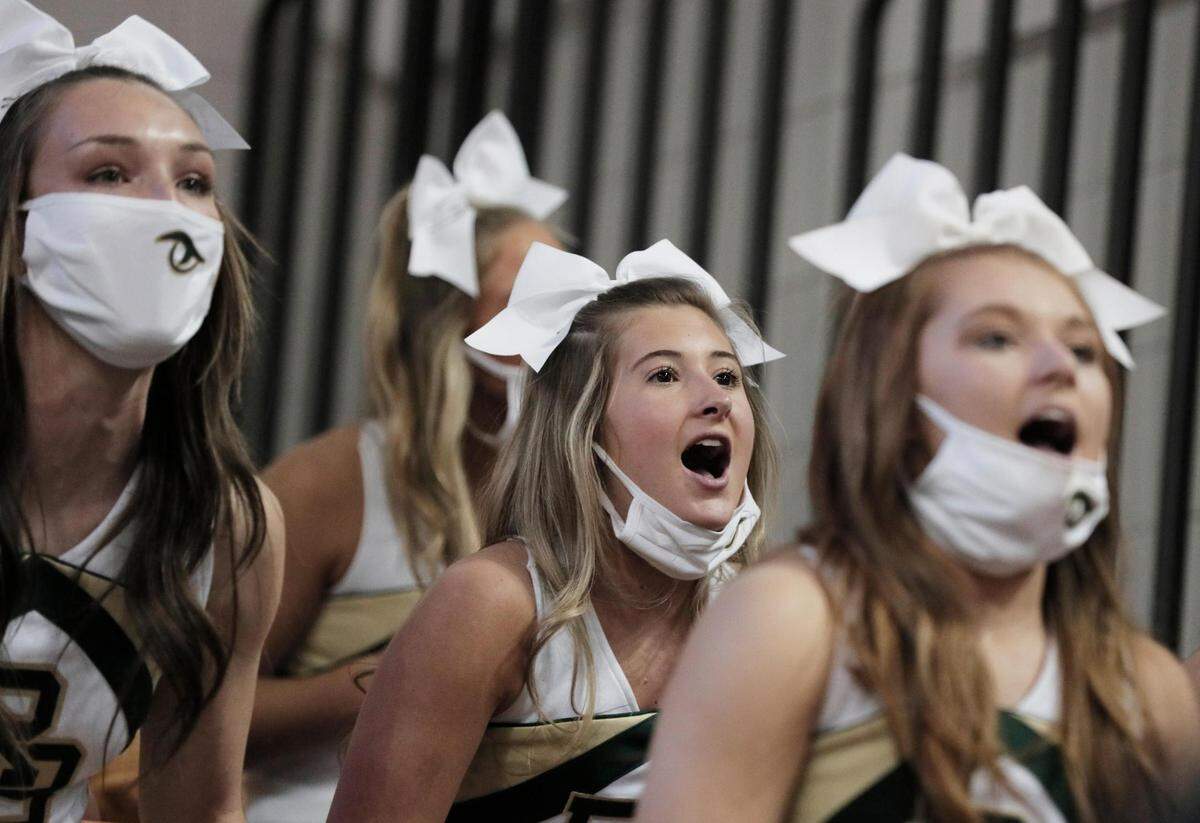 River Bluff’s cheerleaders cheer loudly in Aiken, South Carolina on Saturday, March 6, 2021.