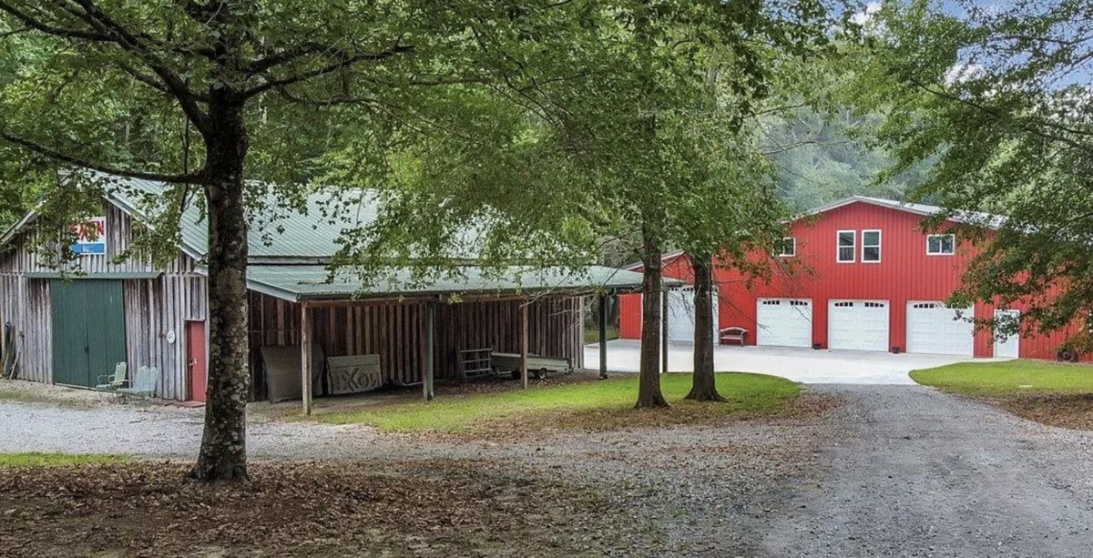 A garage and workshop sit at the rear of the property.